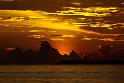 sunset picture telos islands indonesia surf trip waves